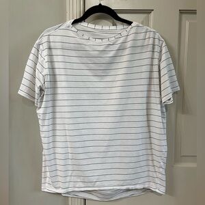 Lululemon back in action, short sleeve shirt. Size 6. White with black stripes.